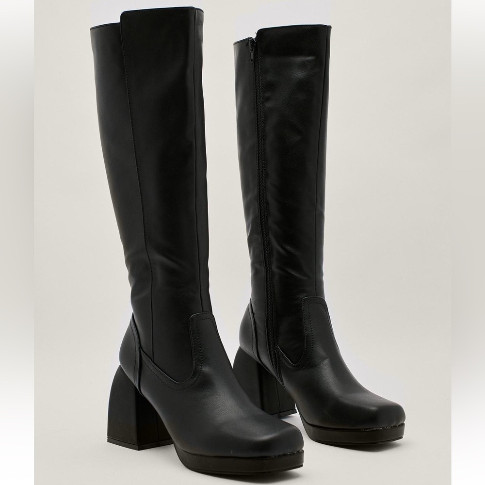 Black knee high heeled boots